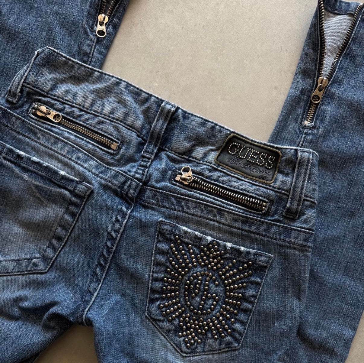 Low-Rise Studded Skinny Jeans